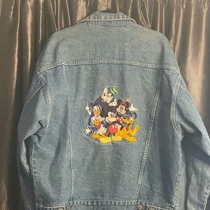Disney denim jacket with Mickey and Friends design.